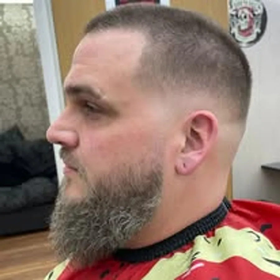 Tight skin fade with full beard